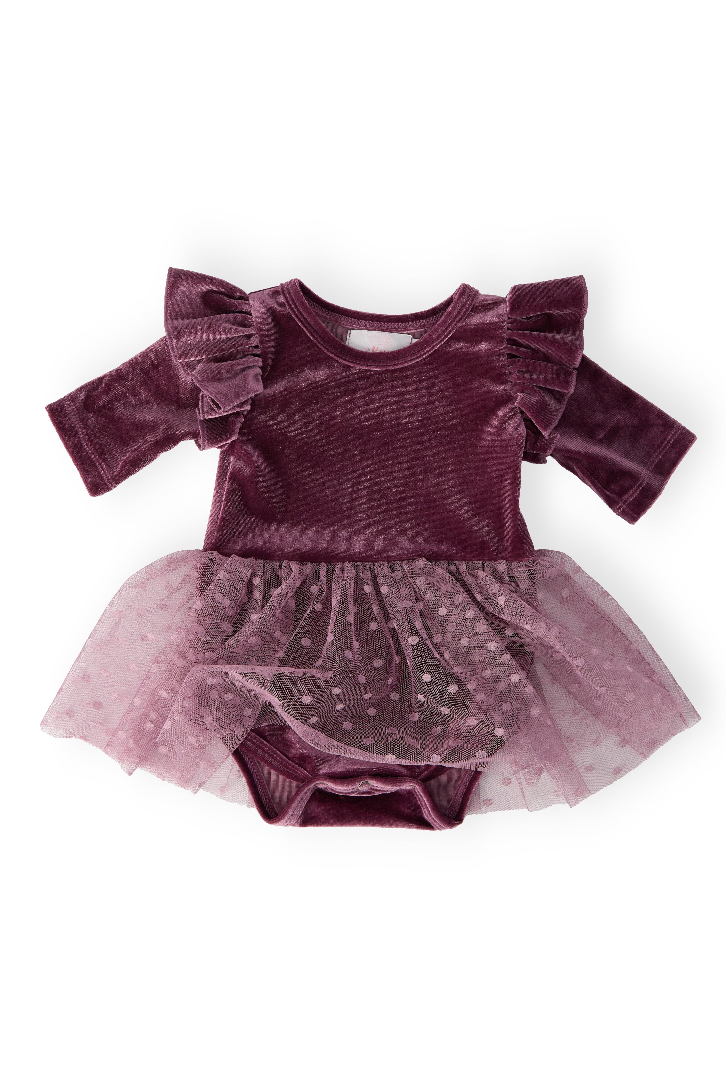Purple velvet romper with ruffled sleeves and tulle skirt on a white background